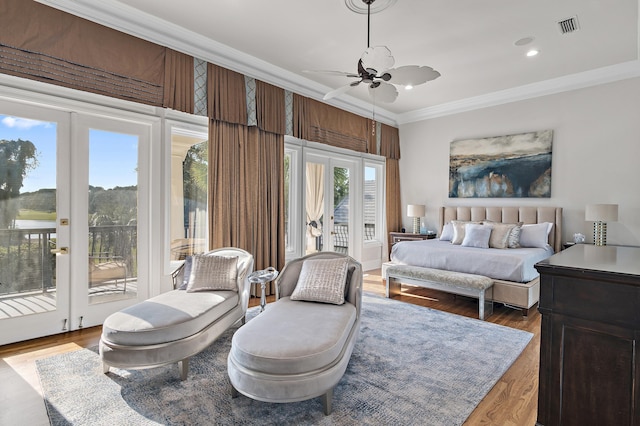 2940 Pine Valley Dr, Miramar Beach, FL 32550 - bedroom with access to outside, ornamental molding, recessed lighting, visible vents, and wood finished floors