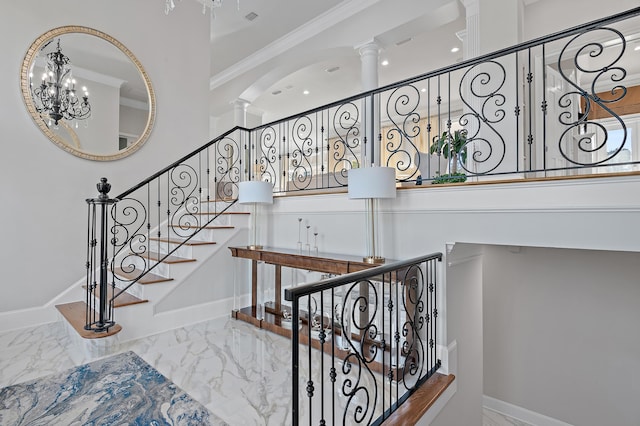 2940 Pine Valley Dr, Miramar Beach, FL 32550 - stairs featuring baseboards, crown molding, ornate columns, a towering ceiling, and marble finish floor
