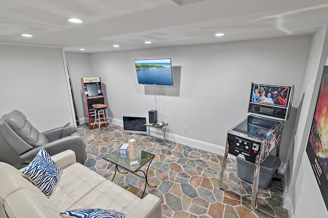2940 Pine Valley Dr, Miramar Beach, FL 32550 - living room with stone floors, baseboards, and recessed lighting