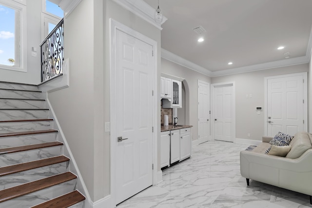 2940 Pine Valley Dr, Miramar Beach, FL 32550 - interior space with ornamental molding, recessed lighting, visible vents, arched walkways, and marble finish floor