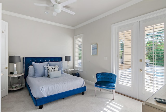 2940 Pine Valley Dr, Miramar Beach, FL 32550 - bedroom with french doors, access to exterior, carpet flooring, and ornamental molding