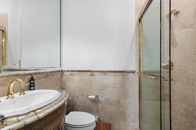2940 Pine Valley Dr, Miramar Beach, FL 32550 - full bath with tiled shower, vanity, tile walls, and toilet