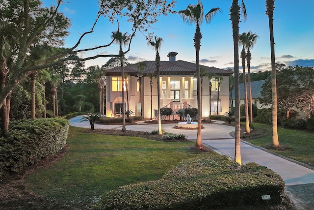2940 Pine Valley Dr, Miramar Beach, FL 32550 - view of front of property with a lawn and stucco siding