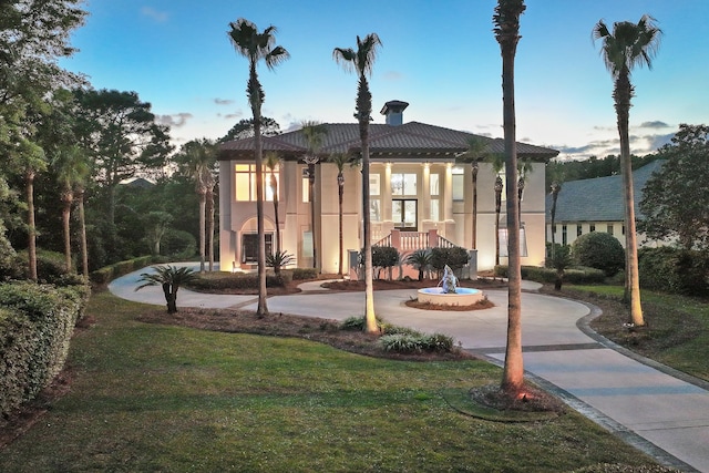 2940 Pine Valley Dr, Miramar Beach, FL 32550 - view of front of home featuring stucco siding and a front lawn