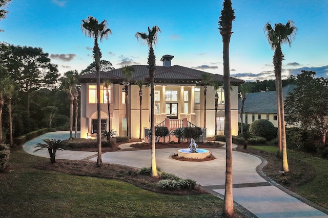 2940 Pine Valley Dr, Miramar Beach, FL 32550 - rear view of property with french doors, a chimney, and stucco siding
