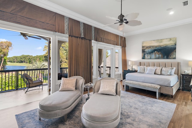 2940 Pine Valley Dr, Miramar Beach, FL 32550 - bedroom featuring a water view, visible vents, access to outside, and crown molding