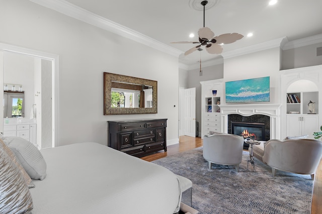 2940 Pine Valley Dr, Miramar Beach, FL 32550 - bedroom featuring multiple windows, crown molding, and wood finished floors