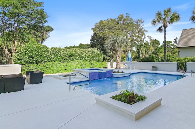2940 Pine Valley Dr, Miramar Beach, FL 32550 - view of pool featuring a pool with connected hot tub and a patio
