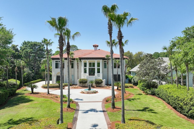 2940 Pine Valley Dr, Miramar Beach, FL 32550 - view of front of property featuring stucco siding, a tile roof, and a front lawn