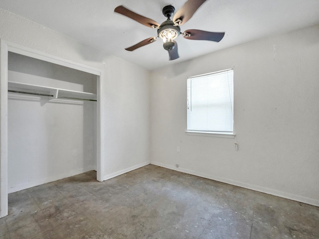 unfurnished bedroom featuring a closet, ceiling fan, and unfinished concrete floors