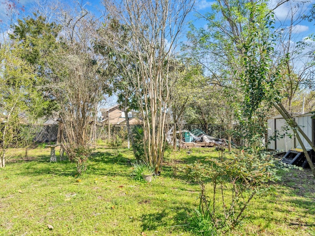 view of yard with fence