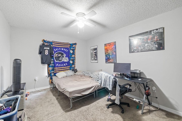 bedroom with baseboards, carpet flooring, a textured ceiling, and ceiling fan