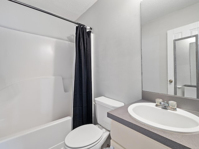 full bath featuring shower / bathtub combination with curtain, a textured ceiling, vanity, and toilet