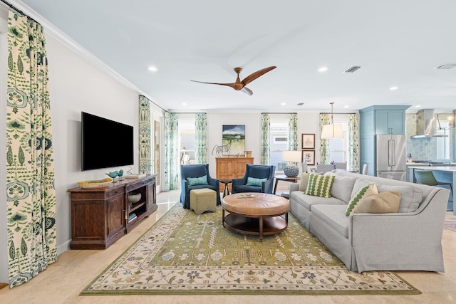 living area featuring visible vents, recessed lighting, crown molding, and a ceiling fan