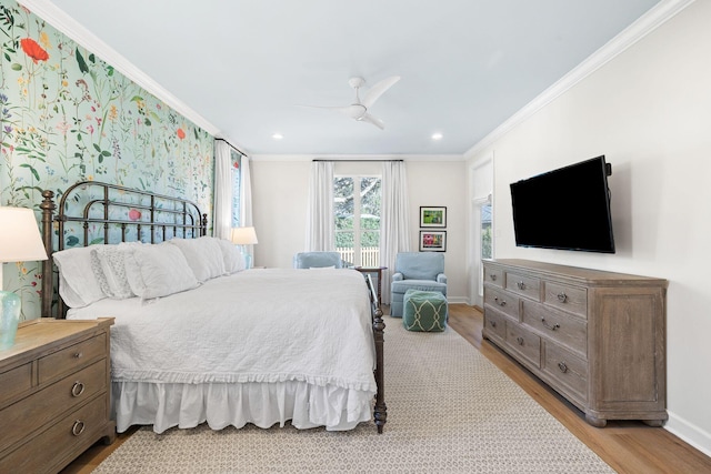 bedroom featuring light wood finished floors, crown molding, ceiling fan, baseboards, and recessed lighting