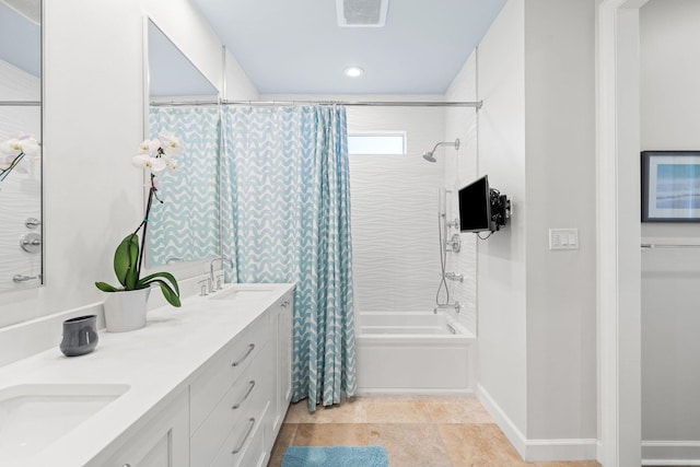 bathroom with double vanity, visible vents, shower / tub combo, and a sink