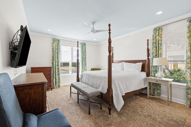 bedroom featuring crown molding, recessed lighting, wood finished floors, and baseboards