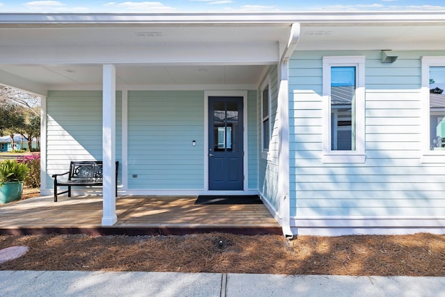 entrance to property with a porch