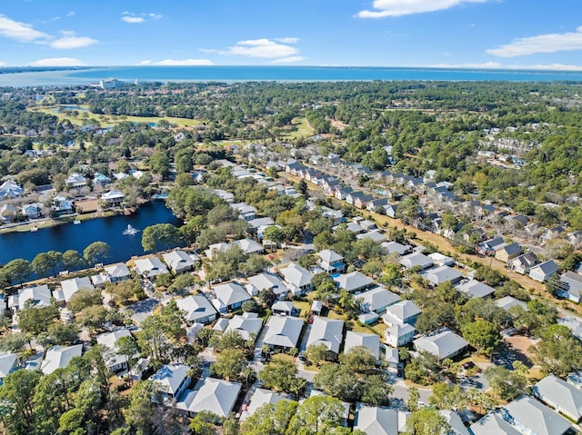 birds eye view of property featuring a residential view and a water view