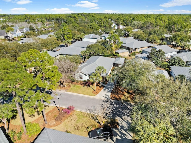 bird's eye view with a view of trees and a residential view