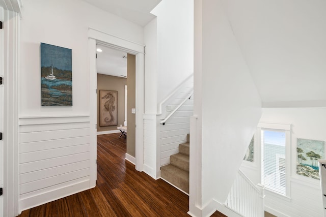 stairs featuring baseboards and wood finished floors