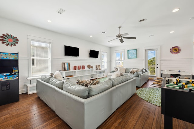 living room with a ceiling fan, recessed lighting, dark wood-style floors, and visible vents