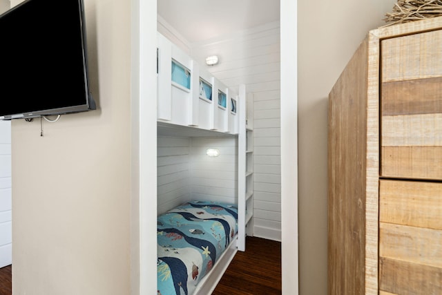 bedroom with wood finished floors