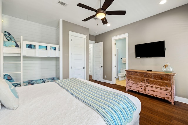 bedroom with recessed lighting, wood finished floors, visible vents, and baseboards