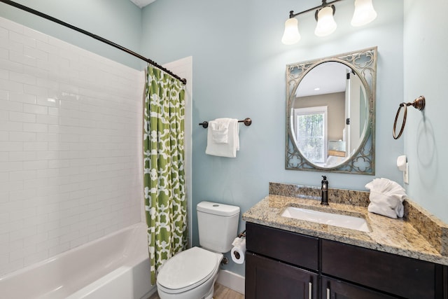 full bath featuring shower / bathtub combination with curtain, toilet, and vanity