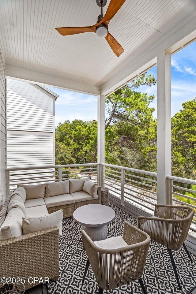 exterior space with a ceiling fan