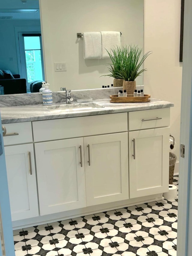 150 Grande Pointe Cir, Inlet Beach, FL 32461 - bathroom featuring vanity, ensuite bathroom, and tile patterned floors