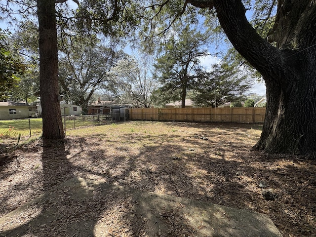 view of yard with fence