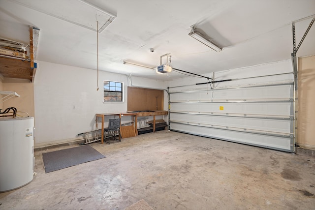 garage with electric water heater and a garage door opener