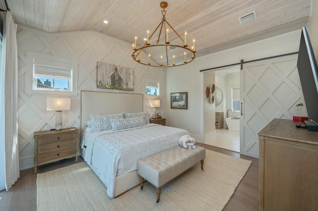 bedroom with visible vents, lofted ceiling, a barn door, wooden ceiling, and a chandelier