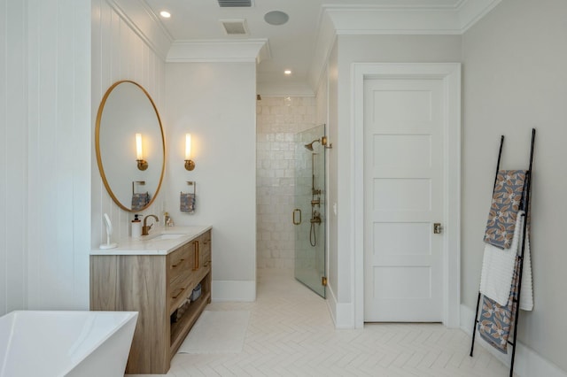 full bath featuring visible vents, double vanity, a sink, ornamental molding, and a shower stall