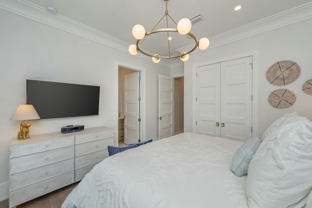 bedroom featuring visible vents, ornamental molding, recessed lighting, a closet, and an inviting chandelier