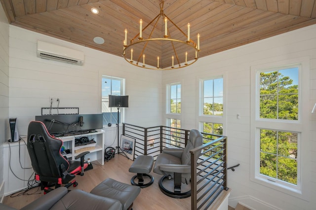 workout area with a wealth of natural light, wooden ceiling, a wall unit AC, and wood finished floors