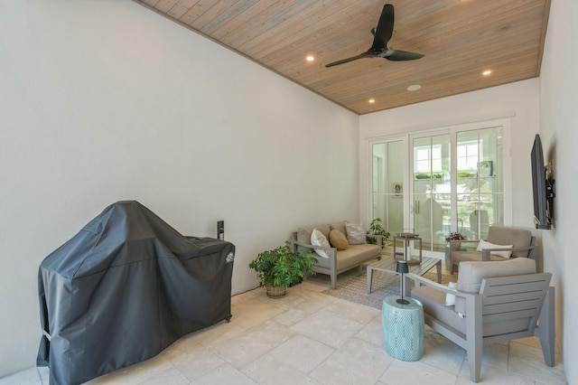 interior space featuring area for grilling, ceiling fan, and outdoor lounge area