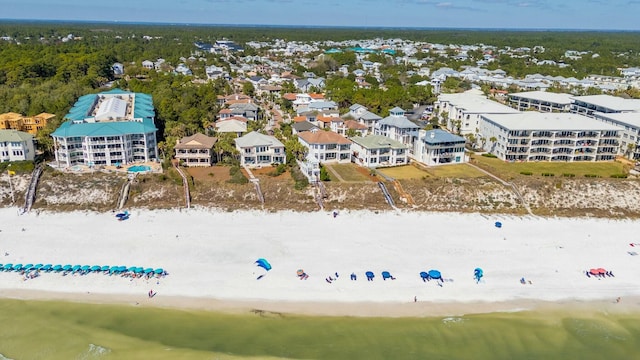 aerial view featuring a water view and a beach view