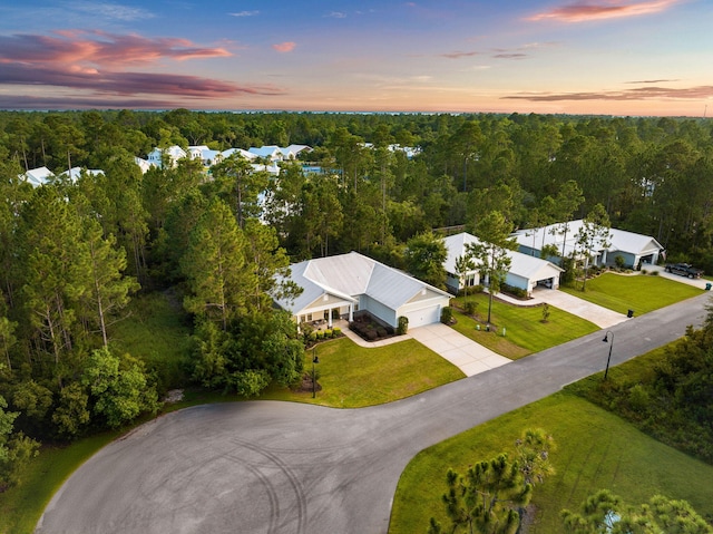 bird's eye view with a forest view