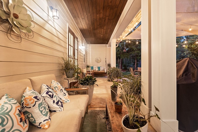 view of patio featuring a porch