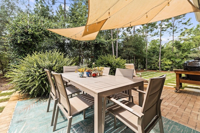 view of patio with outdoor dining area