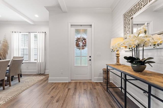 entrance foyer with wood finished floors, baseboards, recessed lighting, crown molding, and beamed ceiling