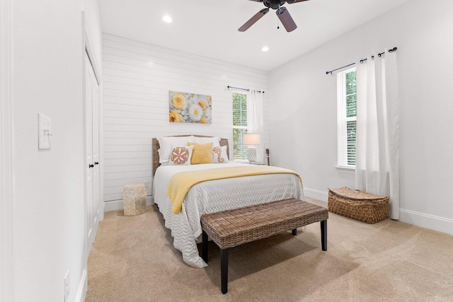 bedroom featuring recessed lighting, baseboards, carpet, and a ceiling fan