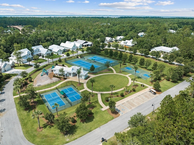 drone / aerial view with a view of trees