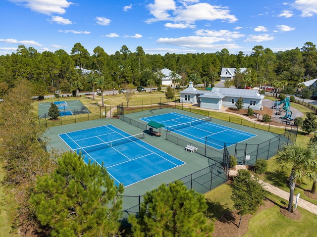 view of sport court with fence