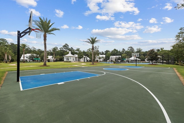 view of sport court with community basketball court and a yard