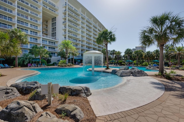 pool with a patio area