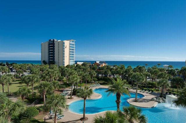 community pool featuring a water view