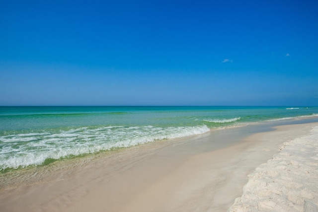 property view of water featuring a view of the beach